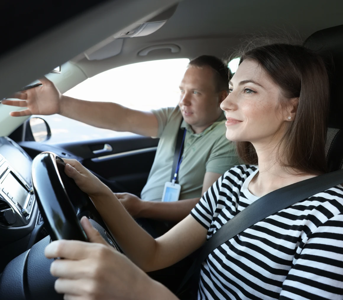 Driver and instructor in car session